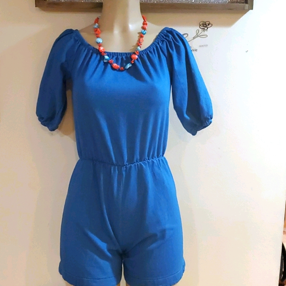 Positively gorgeous off the shoulder rumper.